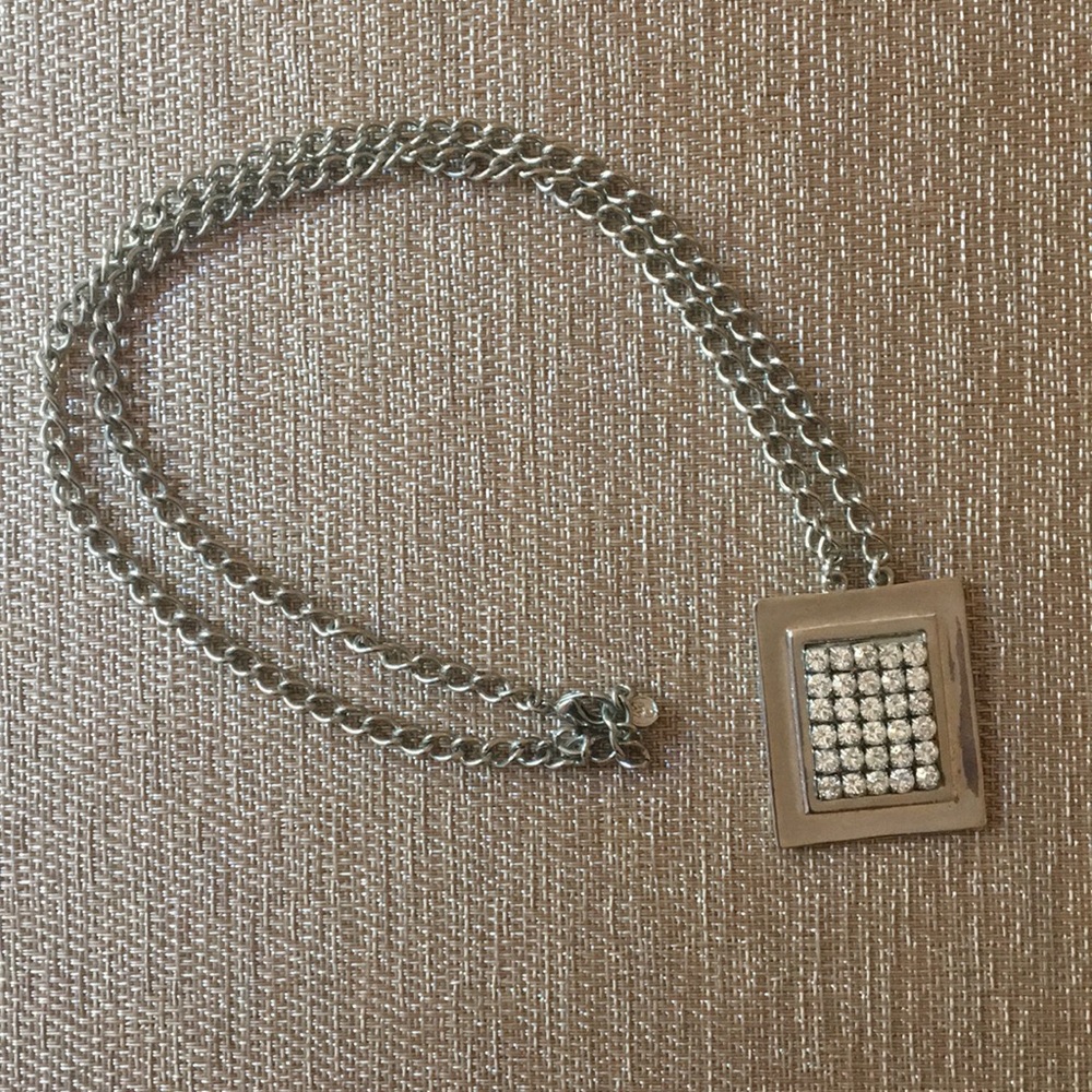 Silver necklace with rhinestone pendant
